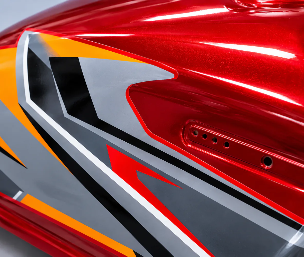 Fuel Tank for Honda CG125 – Red with Grey and Orange Decal, close-up