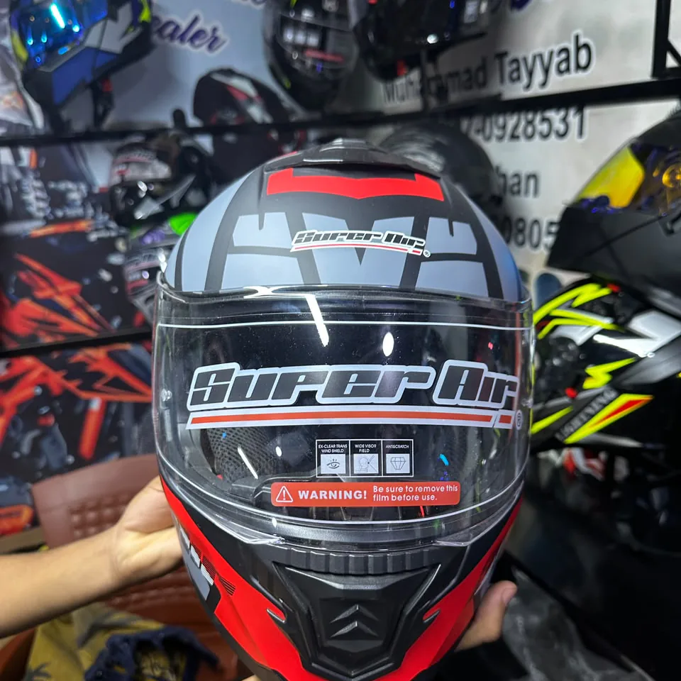 Super Air SP-915 modular helmet in matte grey, red and black with the chin bar closed, a Super Air helmet sold in Pakistan